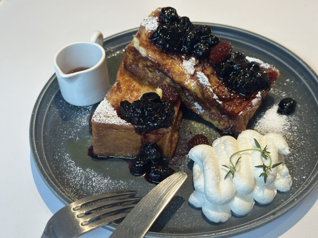 French toast on white plate at Alnuovo cafe — hongdae brunch specialty