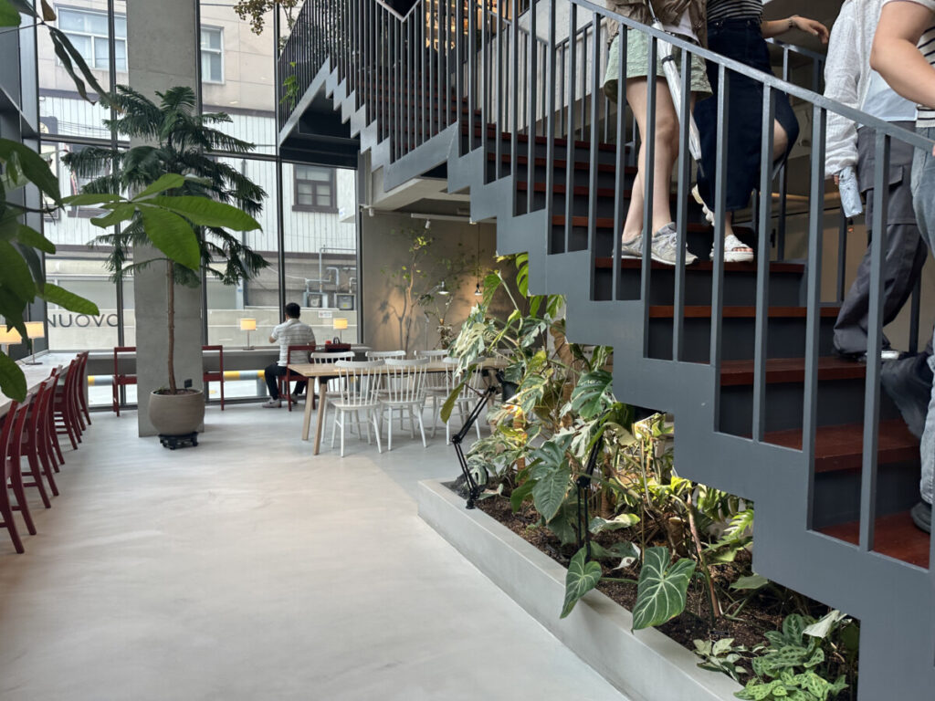 1st floor cafe under Alnuovo restaurant, modern interior with natural light — hongdae brunch atmosphere