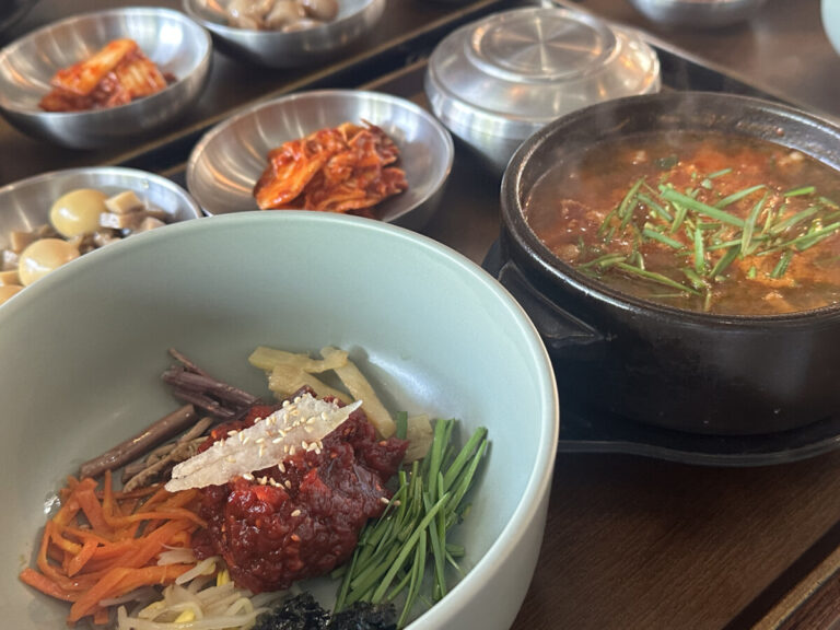 Colorful yukhoe bibimbap served with fresh vegetables, perfect as a must-try dish at this Yeonnamdong restaurant hidden gem.