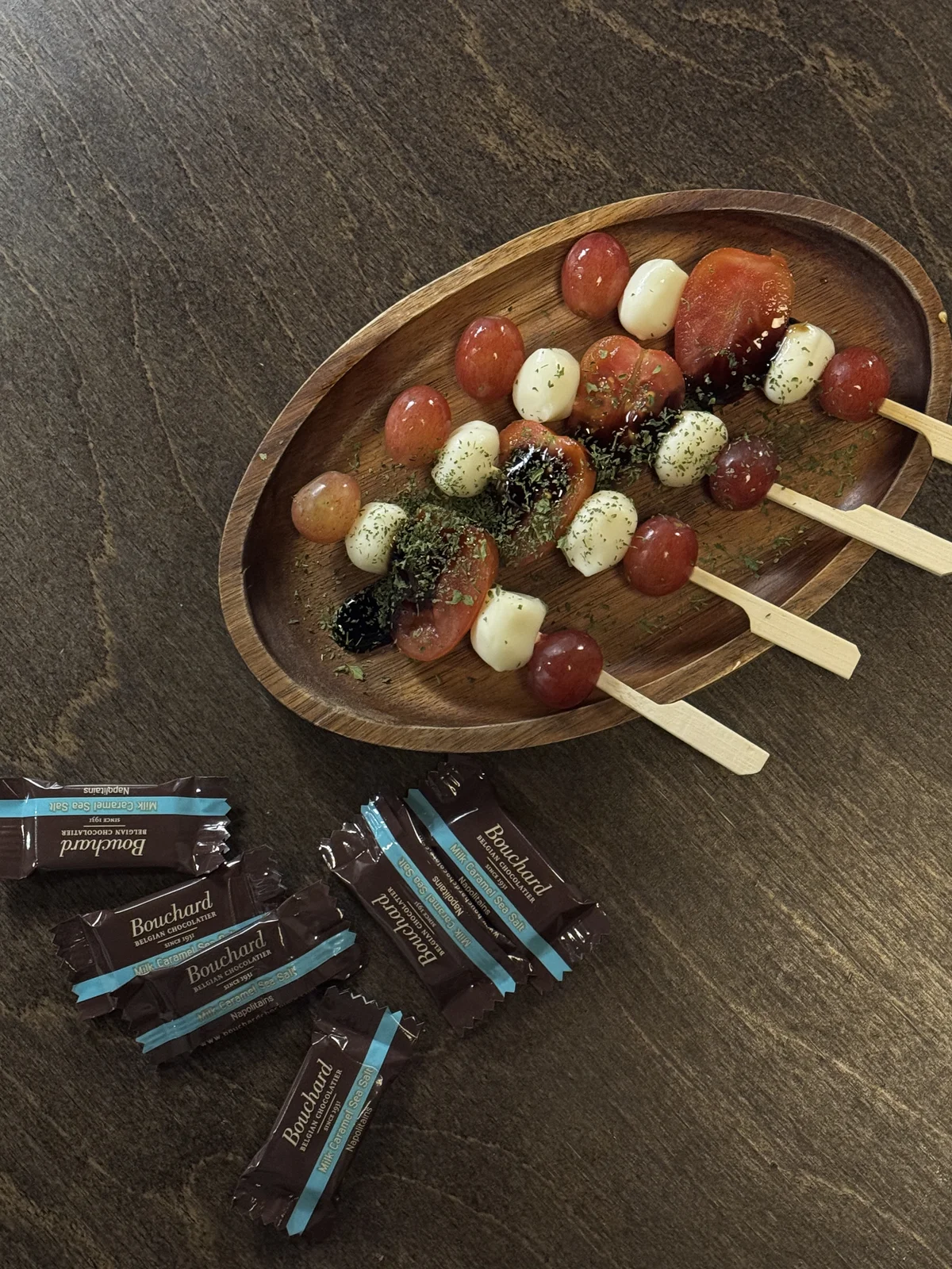 Fruit and cheese skewers with balsamic glaze served at Jeokon