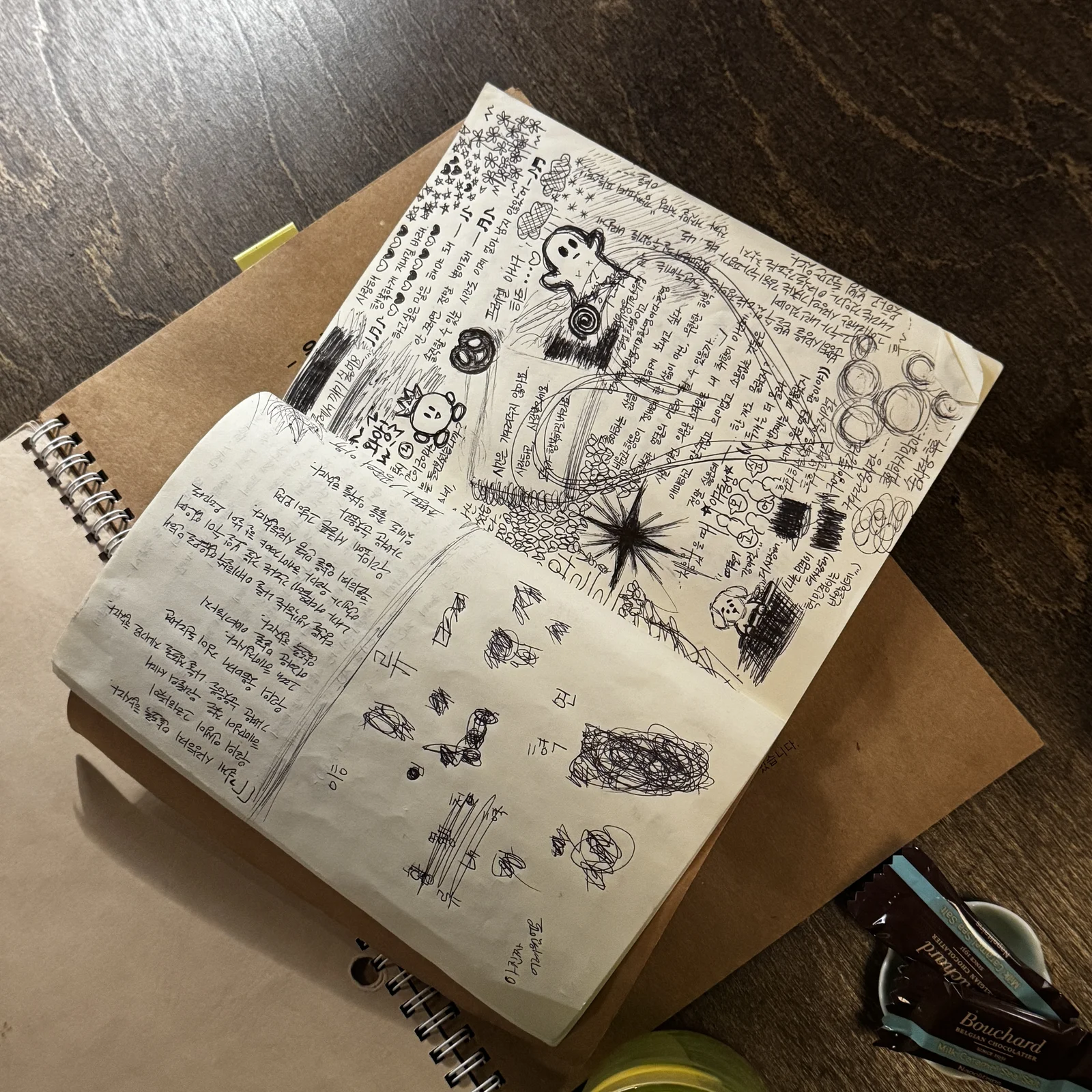Hand-drawn doodles and notes fill the guestbook at Jeokon book bar