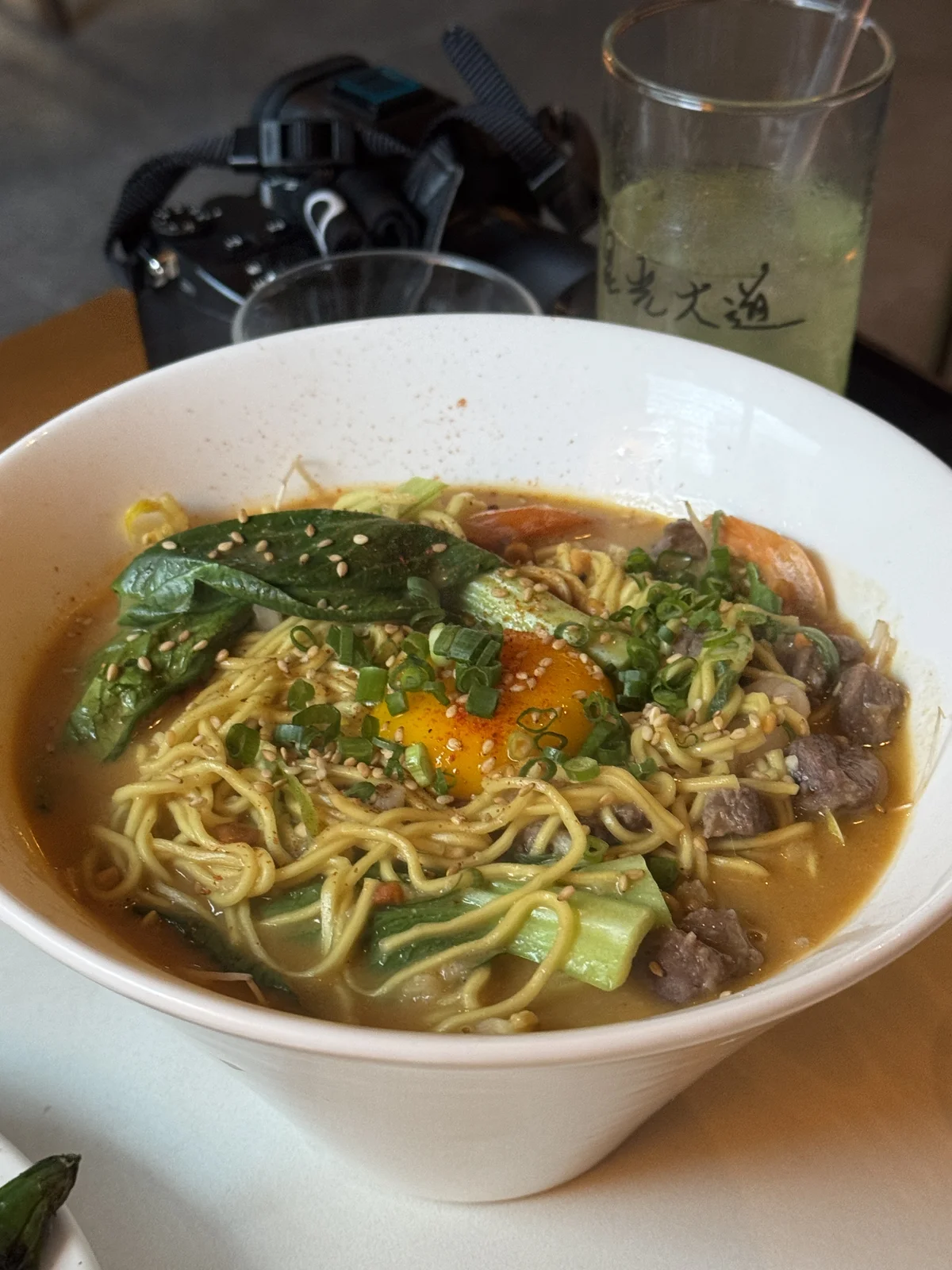 Tantanmen noodles with soft egg yolk and beef at this Haebangchon bar